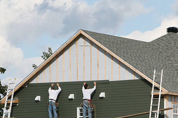 Professional Vinyl Siding technician working in Richland, PA